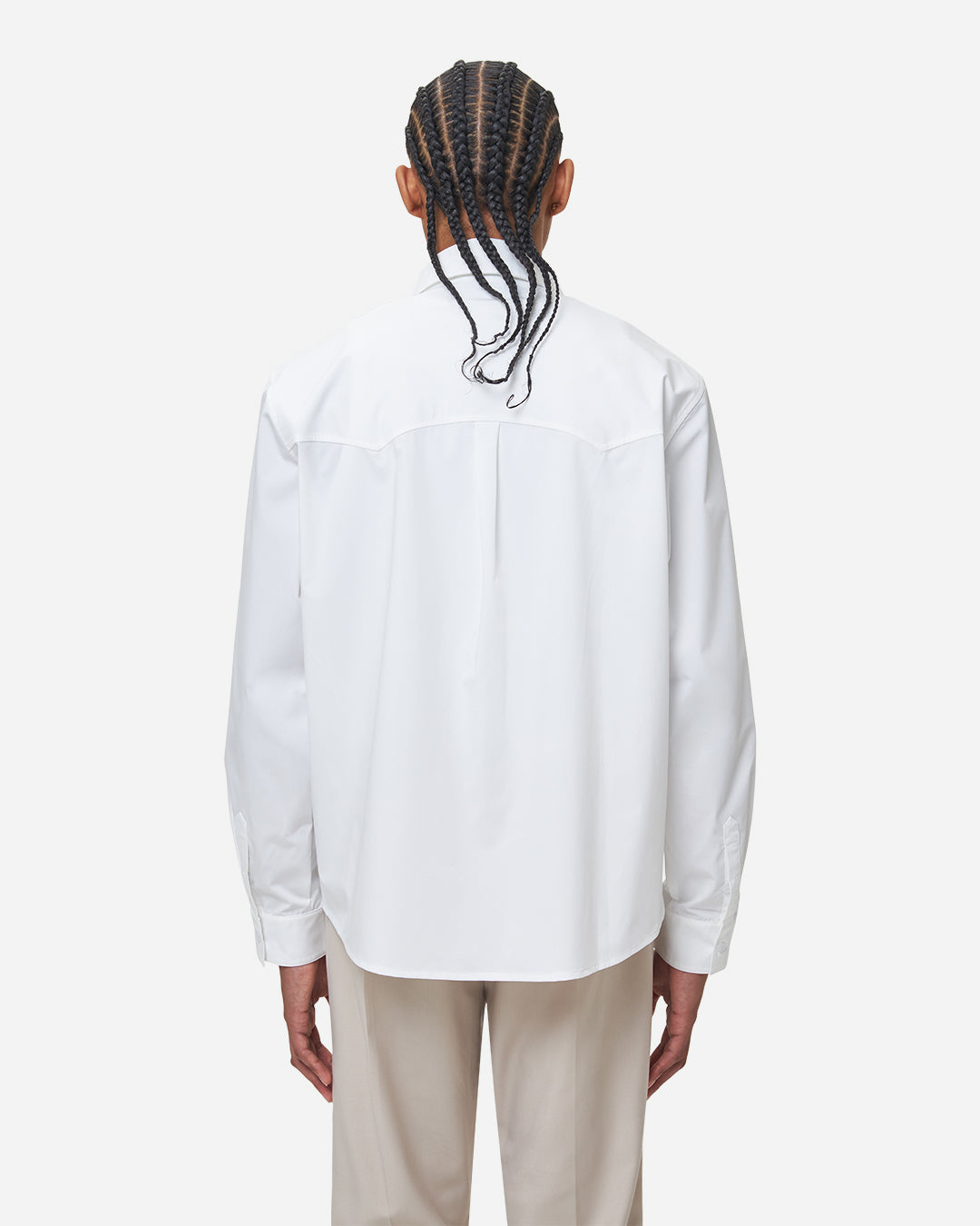 The Chesed, Cotton Dress Shirt is cut to a relaxed fit on hip length. Crafted from a soft and smooth compact cotton canvas.
