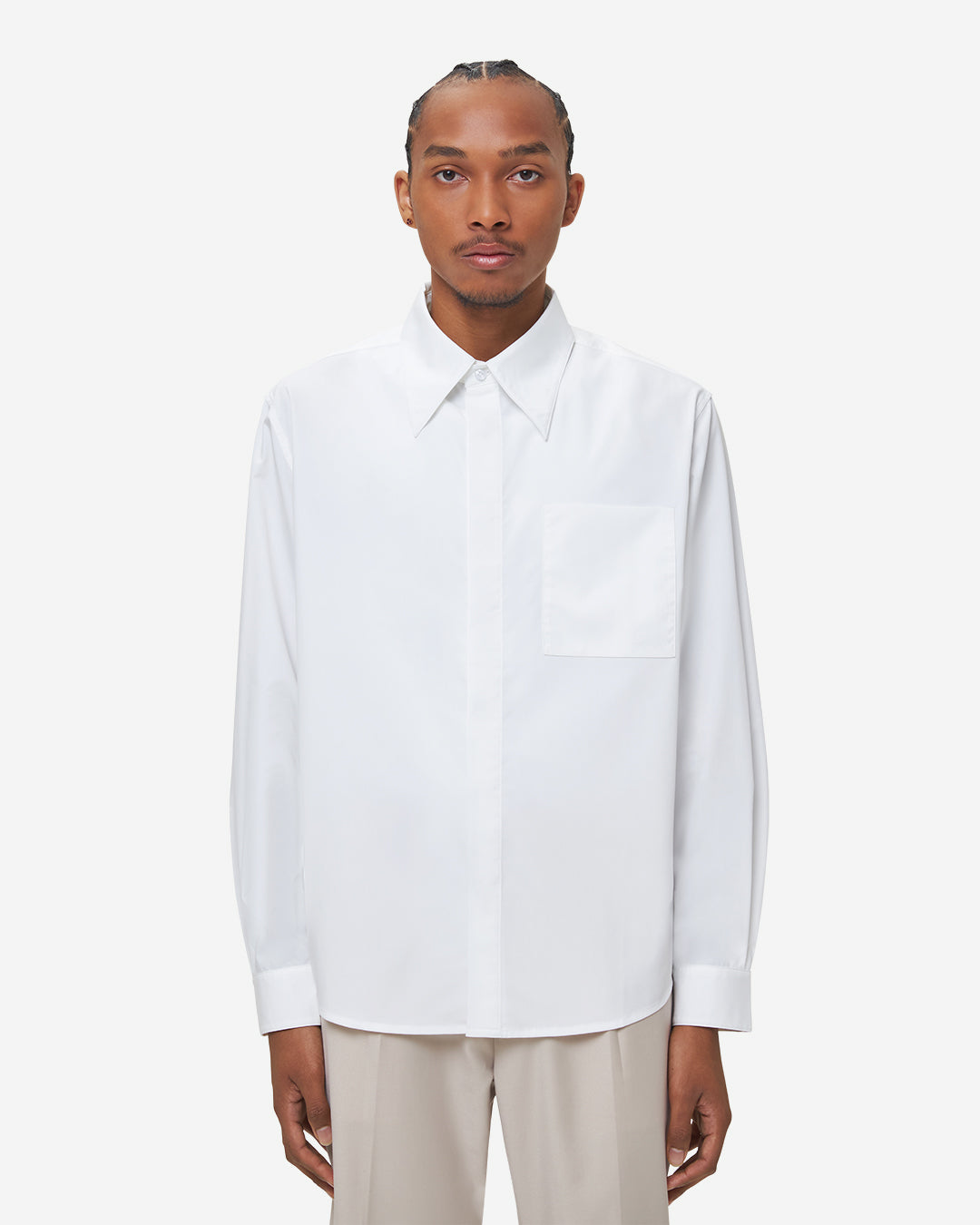 The Chesed, Cotton Dress Shirt is cut to a relaxed fit on hip length. Crafted from a soft and smooth compact cotton canvas.