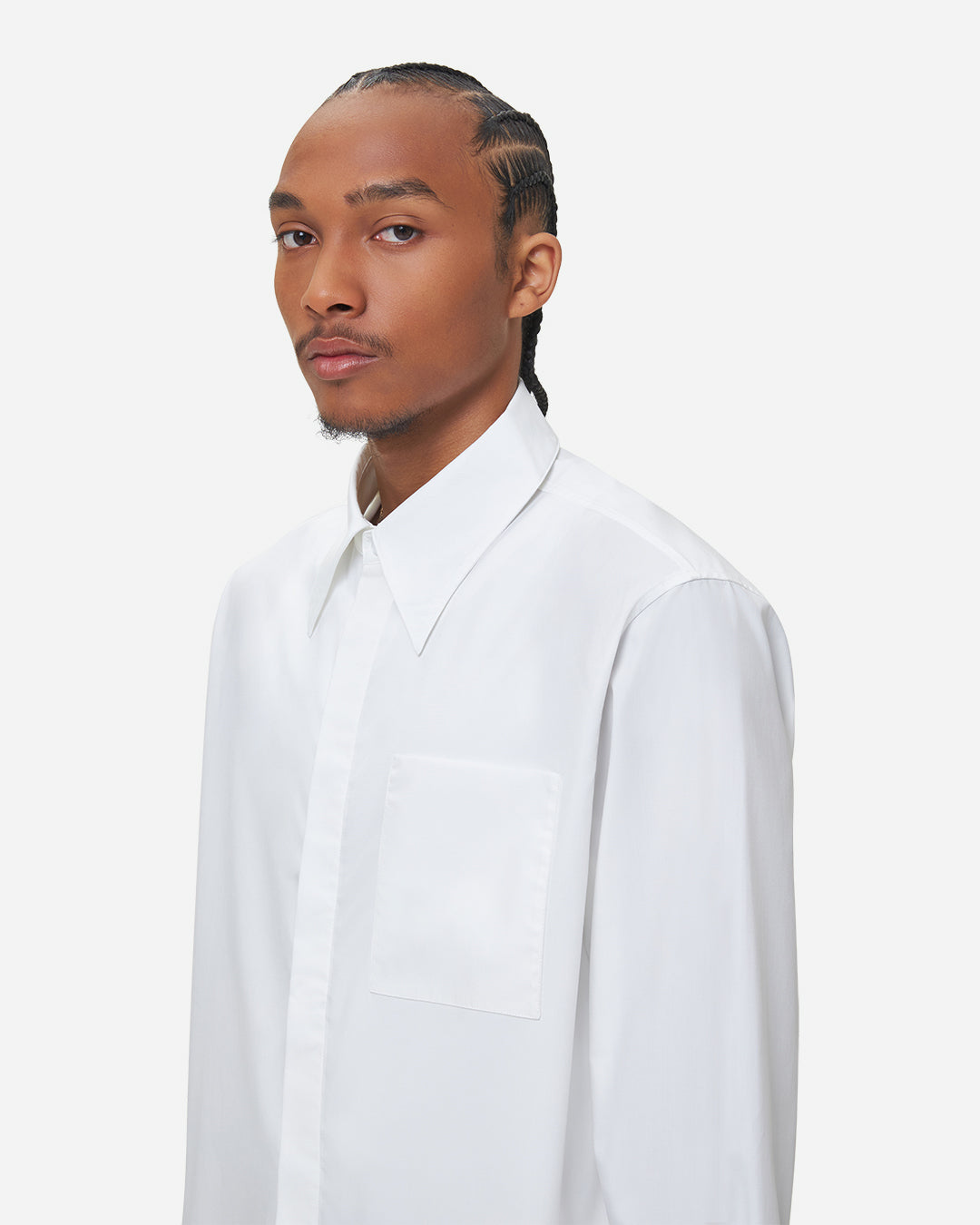The Chesed, Cotton Dress Shirt is cut to a relaxed fit on hip length. Crafted from a soft and smooth compact cotton canvas.